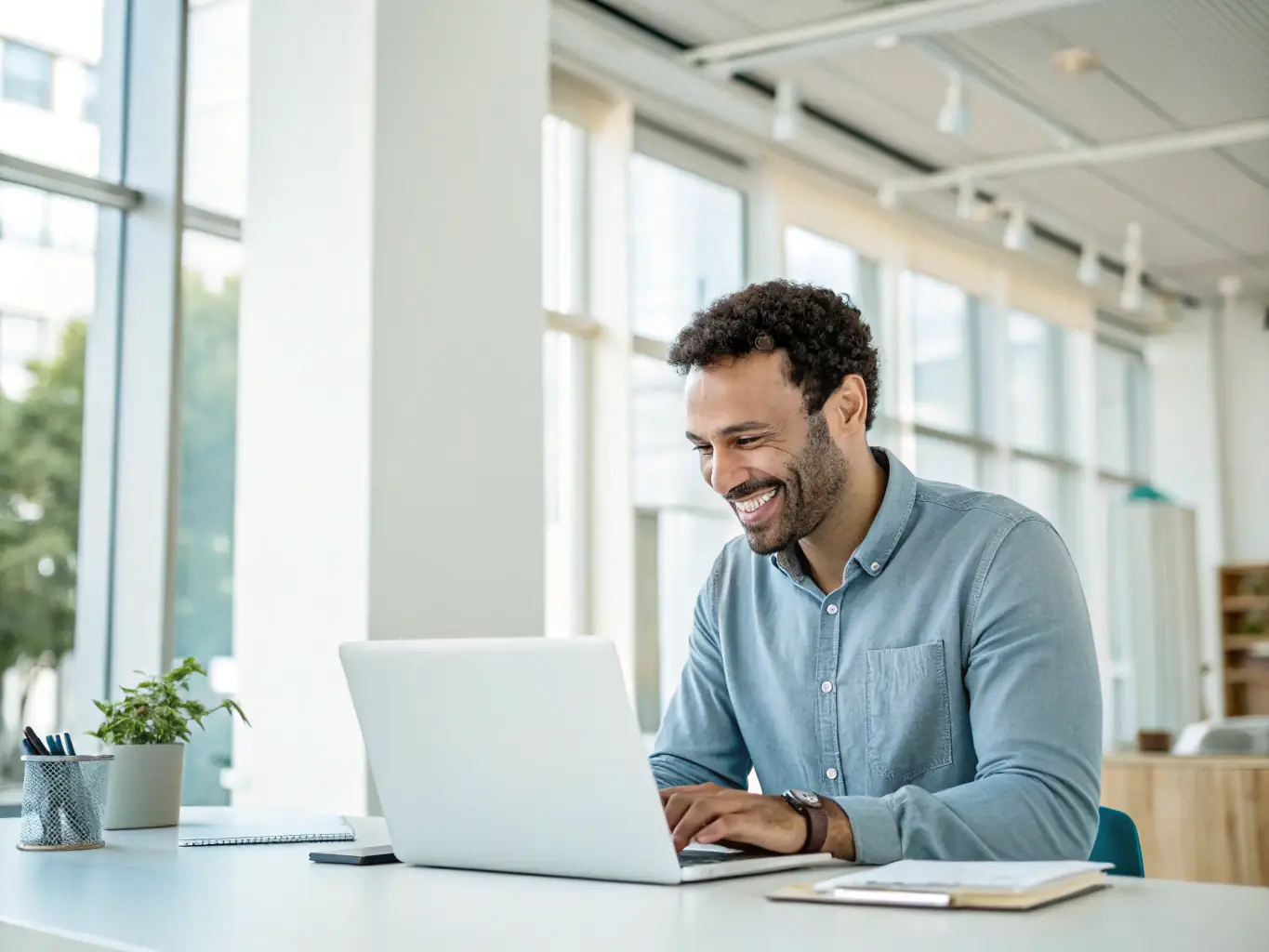 A customer testimonial video playing on a laptop screen, showcasing positive feedback and successful project outcomes.